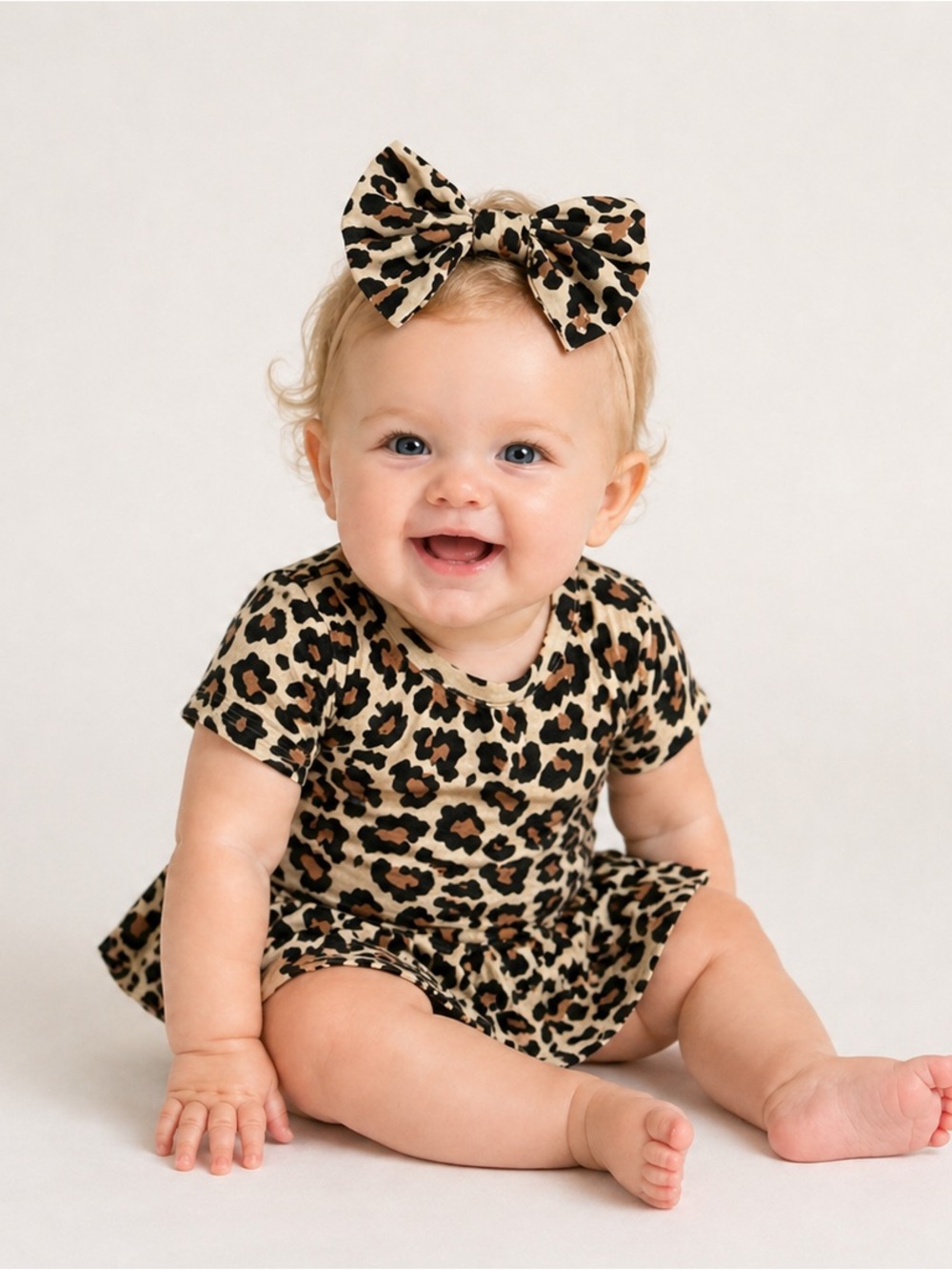 Posh Peanut Leopard Print One-Piece Bodysuit w/ Flare Skirt & Bow — Tan & Black